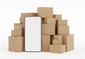 Smartphone with blank screen in front of a pile of cardboard delivery boxes Royalty Free Stock Photo