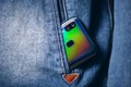 smartphone with dual camera lens on the jeans pocket Royalty Free Stock Photo