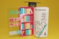 Smartphone with book, bookshelf library, book lecture, graduation cap and pencil on yellow background.Online education on website