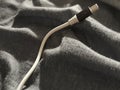 Smartphone Cable Over Bed Blanket