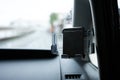 Smartphone car holder installed inside a car. Royalty Free Stock Photo