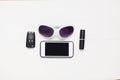 Smartphone, car key, glasses lipstick Royalty Free Stock Photo