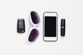 Smartphone, car key, glasses lipstick Royalty Free Stock Photo