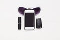 Smartphone, car key, glasses lipstick Royalty Free Stock Photo