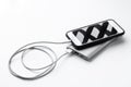 Smartphone charging with power bank on white background Royalty Free Stock Photo