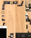 Smartphone components on wooden background Royalty Free Stock Photo