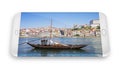 Smartphone concept with 3D render of a typical portuguese boats used in the past to transport the famous port wine Portugal