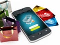 Smartphone, credit cards, shopping bags and basket Royalty Free Stock Photo