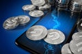Smartphone with Dash coin trading chart on-screen among piles of silver Dash coins with 2019 update logo. 3D rendering