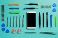 Smartphone disassembly tools, arranged. DIY project.