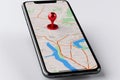 Smartphone display. 3D render with red map pointer icon Royalty Free Stock Photo