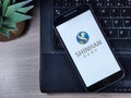 Smartphone displaying logo of Shinhan Bank, a bank headquartered in Seoul, South Korea Royalty Free Stock Photo