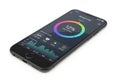 Smartphone displaying a vibrant circular color wheel and graphical data on its screen Royalty Free Stock Photo
