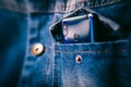 Smartphone with dual camera lens on the jeans pocket Royalty Free Stock Photo