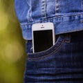 Smartphone in everyday life. phone in jeans pocket. Royalty Free Stock Photo