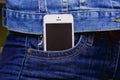 Smartphone in everyday life. phone in jeans pocket. Royalty Free Stock Photo