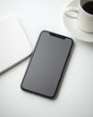 A smartphone featuring a scheduling application sits on a minimalist workspace for effective digital time management