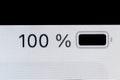 Smartphone full charged battery level indicator - 100 percent: close up macro