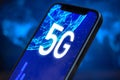 Smartphone with 5G network connection. Future of high speed mobile internet, global wireless technology background photo