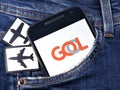 Smartphone with Gol Linhas Areas logo on the screen. Gol Linhas Areas is a Brazilian aviation airline Royalty Free Stock Photo
