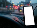 Smartphone or GPS device in a holder in car with blur background of traffic jams in the evening. Mockup white empty screen for Royalty Free Stock Photo
