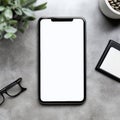 Smartphone on grey surface with glasses plant and wallet in minimalistic workspace Royalty Free Stock Photo
