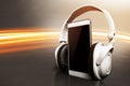 Smartphone with headphones Royalty Free Stock Photo