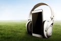 Smartphone with headphones Royalty Free Stock Photo
