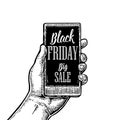 Smartphone hold male hand. Lettered text Black friday BIG SALE. Royalty Free Stock Photo