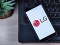 Smartphone with LG Electronics logo on the screen. Lucky Goldstar.