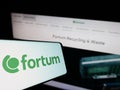 Smartphone with logo of Finnish energy company Fortum Oyj on screen in front of business website. Royalty Free Stock Photo