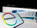 Smartphone with logo of German chemicals company Covestro AG on screen in front of business website. Royalty Free Stock Photo