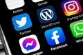 smartphone with mobile apps Twitter, WordPress, Facebook, Instagram on the screen Royalty Free Stock Photo