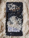 Smartphone / Mobile Phone In The Rice Battery Side