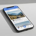 A smartphone with a mock social media app called \