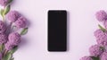 Smartphone mockup screen on purple pastel flowers background. Mockup mobile phone blank empty display flower shop app Royalty Free Stock Photo