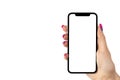 Smartphone mockup in woman hand. New modern black frameless smartphone mockup with blank white screen. Isolated on white backgroun Royalty Free Stock Photo