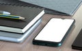 Smartphone, pen, pencil, notebook, file on table with clipping part of smartphoneBusiness concept