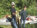 Smartphone picture of two boys showing their catch of walleyes