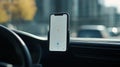 Smartphone showing navigation app in car dashboard