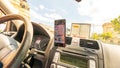 Smartphone showing Waze maps to show the way thru the city
