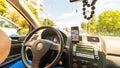 Smartphone showing Waze maps to show the way thru the city