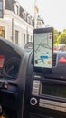 Smartphone showing Waze maps to show the way thru the city