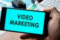 Smartphone with sign Video marketing concept. Royalty Free Stock Photo