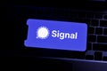 Smartphone with the Signal logo is a free and open source instant messaging
