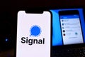Smartphone with the Signal logo is a free and open source instant messaging