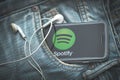 Smartphone with Spotify Music in your jeans pocket Royalty Free Stock Photo