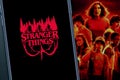 Smartphone with the Stranger Things logo. Stranger Things