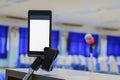 Smartphone take a photo on screen of the meeting room business select focus with shallow depth of field