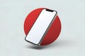 Smartphone tilts against large red circle, creating dynamic floating effect
